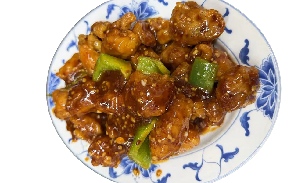 Sesame chicken stir-fry with bell peppers in a savory brown sauce at Imperial Garden, a Chinese Restaurant in Philadelphia